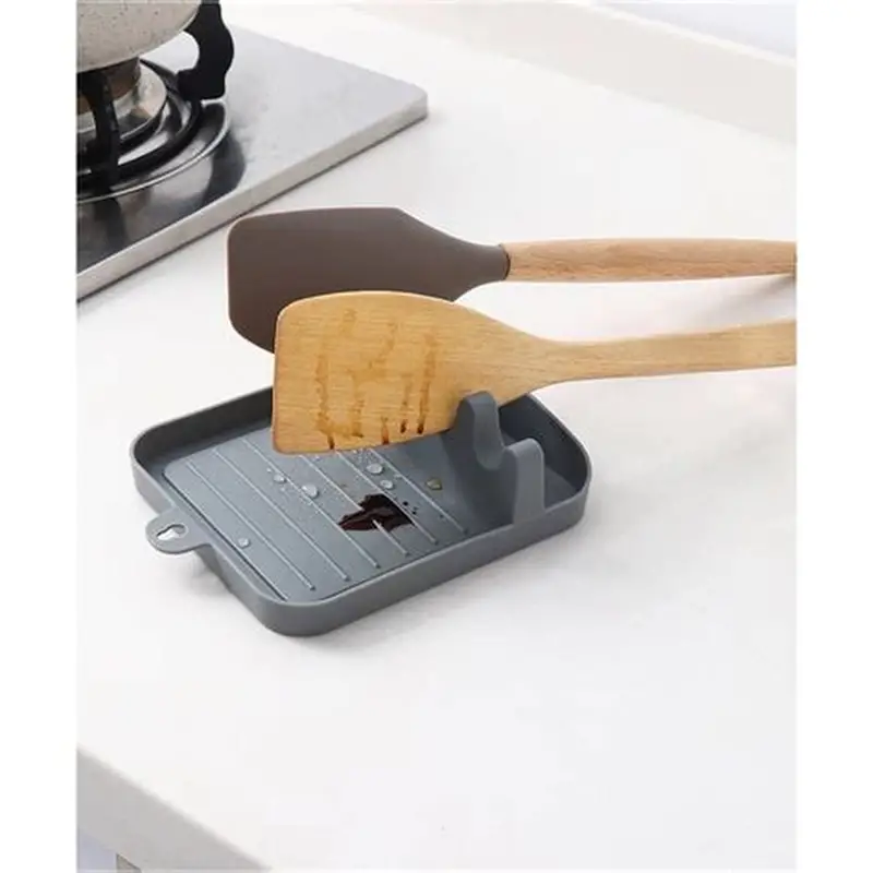 Plastic Oil Spill Spoon Resting